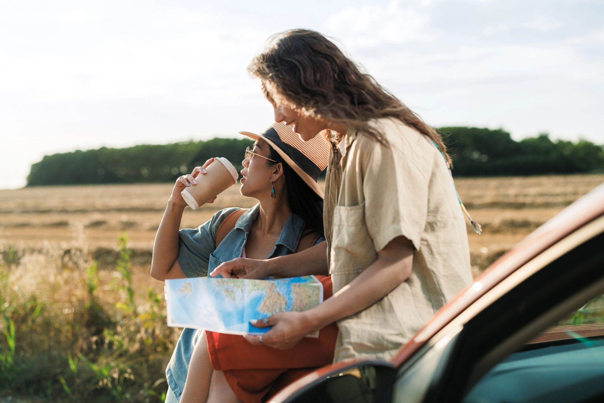 Travelers reviewing a map during a trip